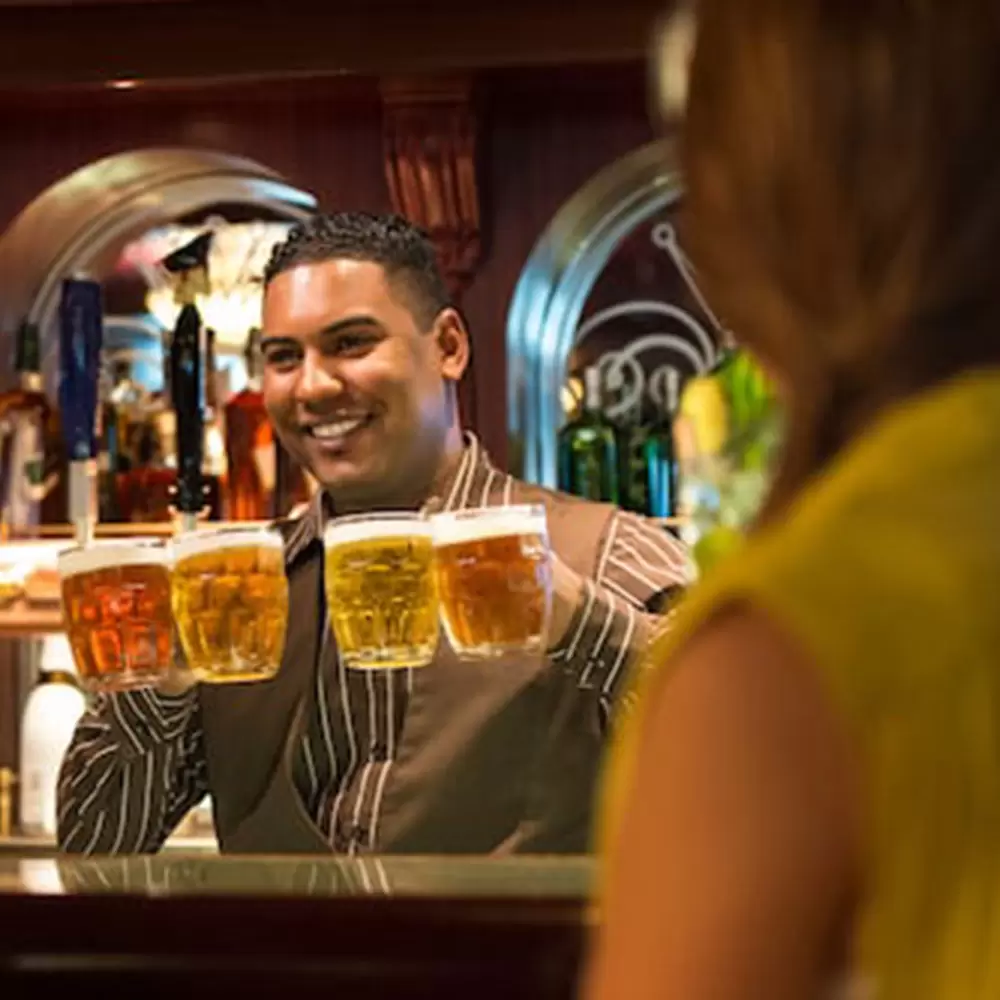 DisneyCruiseLine- people at bar with beer